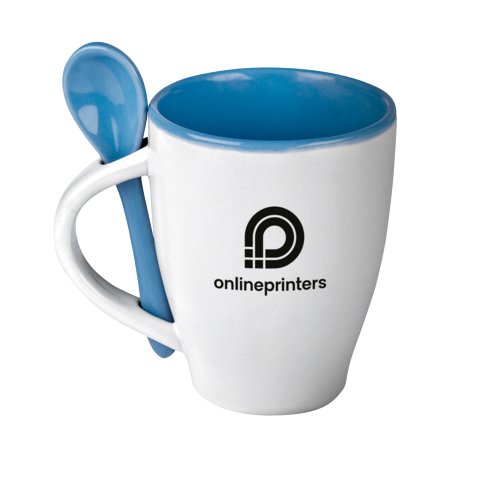 Mug à café en céramique bleue avec cuillère.