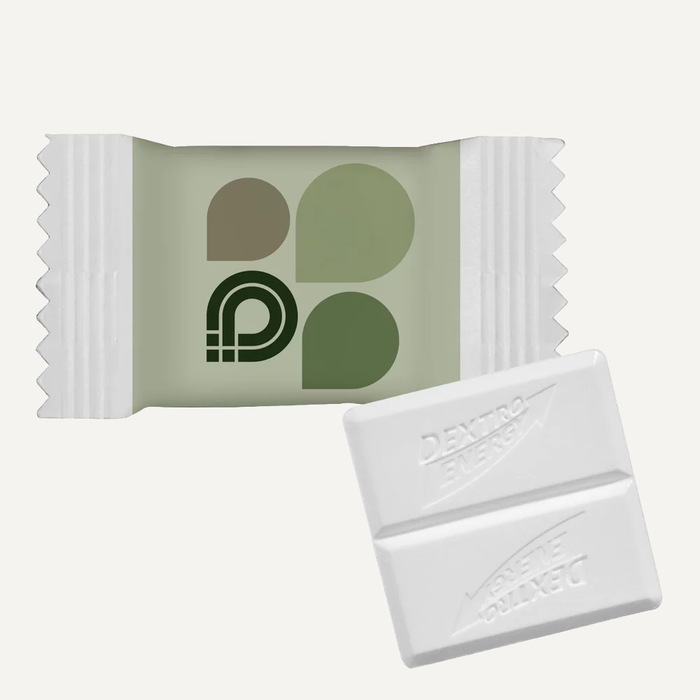 Image Tablettes de dextrose Dextro Energy � c�t� d'un emballage imprim� avec logo